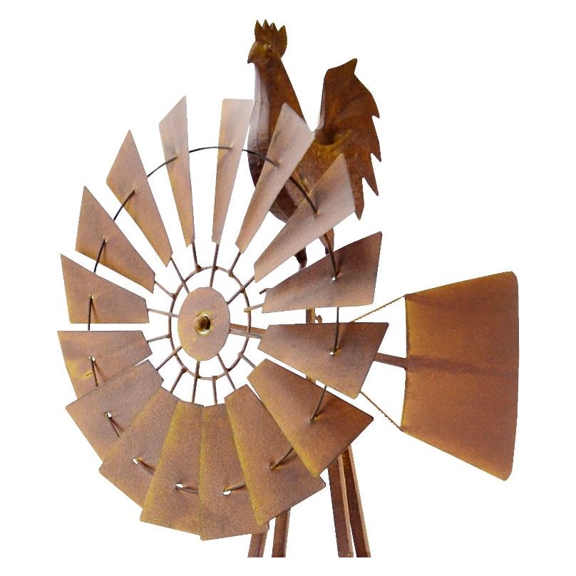 Closeup of spinner on rustic rooster windmill