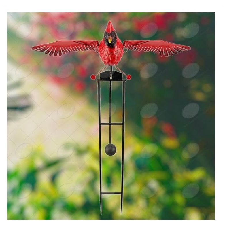 Large rocker Cardinal in a garden setting