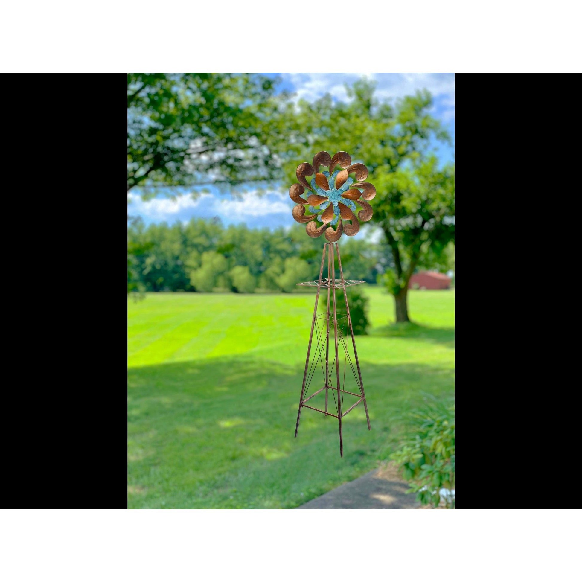 Garden windmill set in a lush green garden